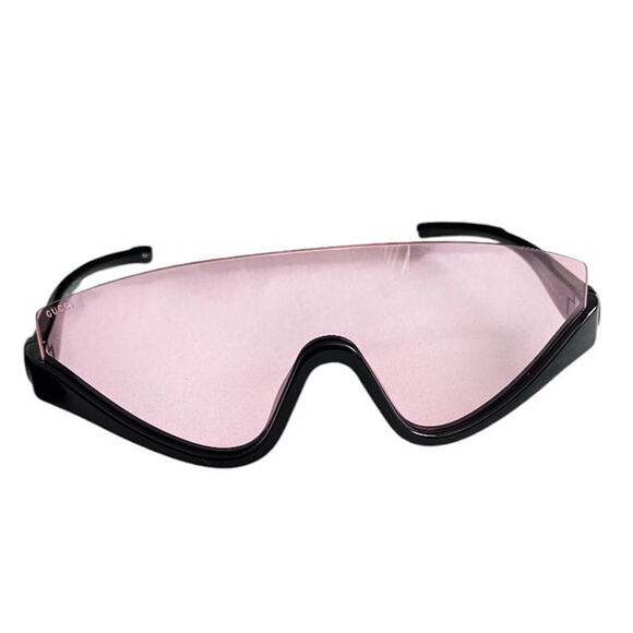 Gucci GG1650S 002 shield mask sunglass with a shiny black frame